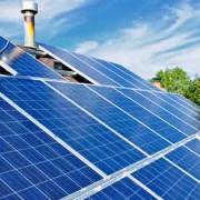 man installing solar panels