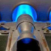 blue natural gas flames coming from furnace