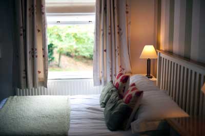 A bedroom that does not have a smoke alarm installed anywhere.