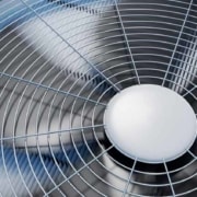 upclose view of fan blades of an air conditioning unit