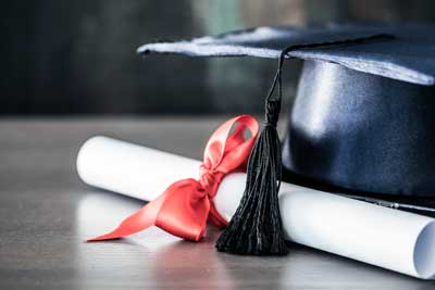 degree or diploma with graduating cap