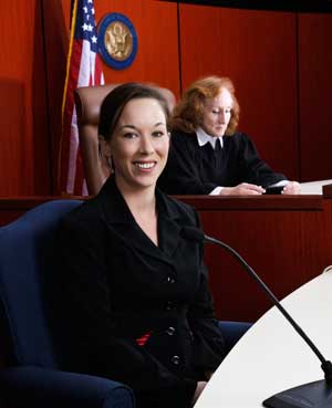 female expert testifying in court before a judge