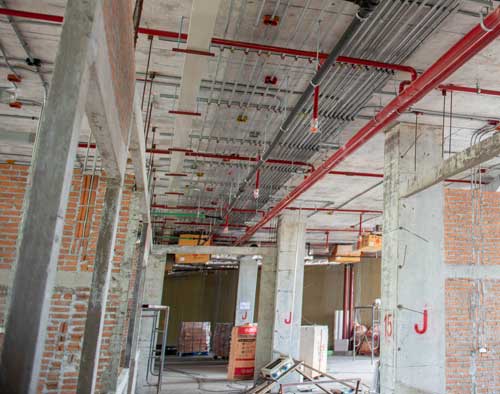 Building under contruction with fire suppression system