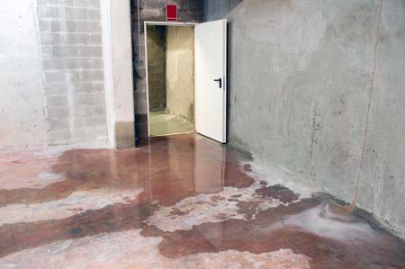 water flooding basement of building