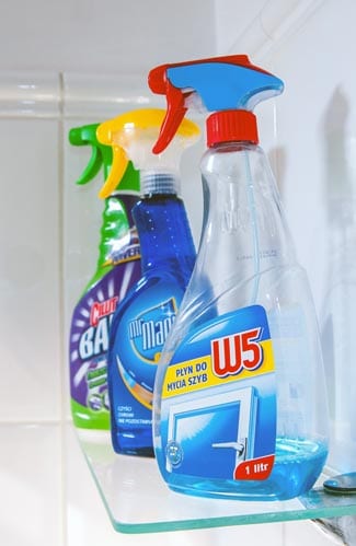Three types of cleaning products on a shelf